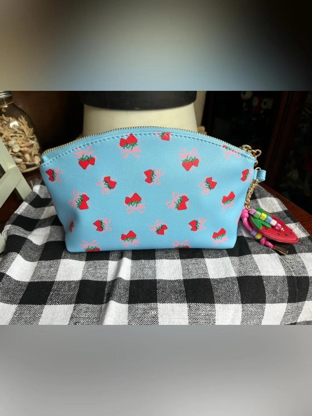 Juicy Couture Light Blue Strawberry Print Wristlet with strawberry bag charm